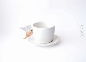 Porcelanowa filiżanka ze skrzydłami plus spodek